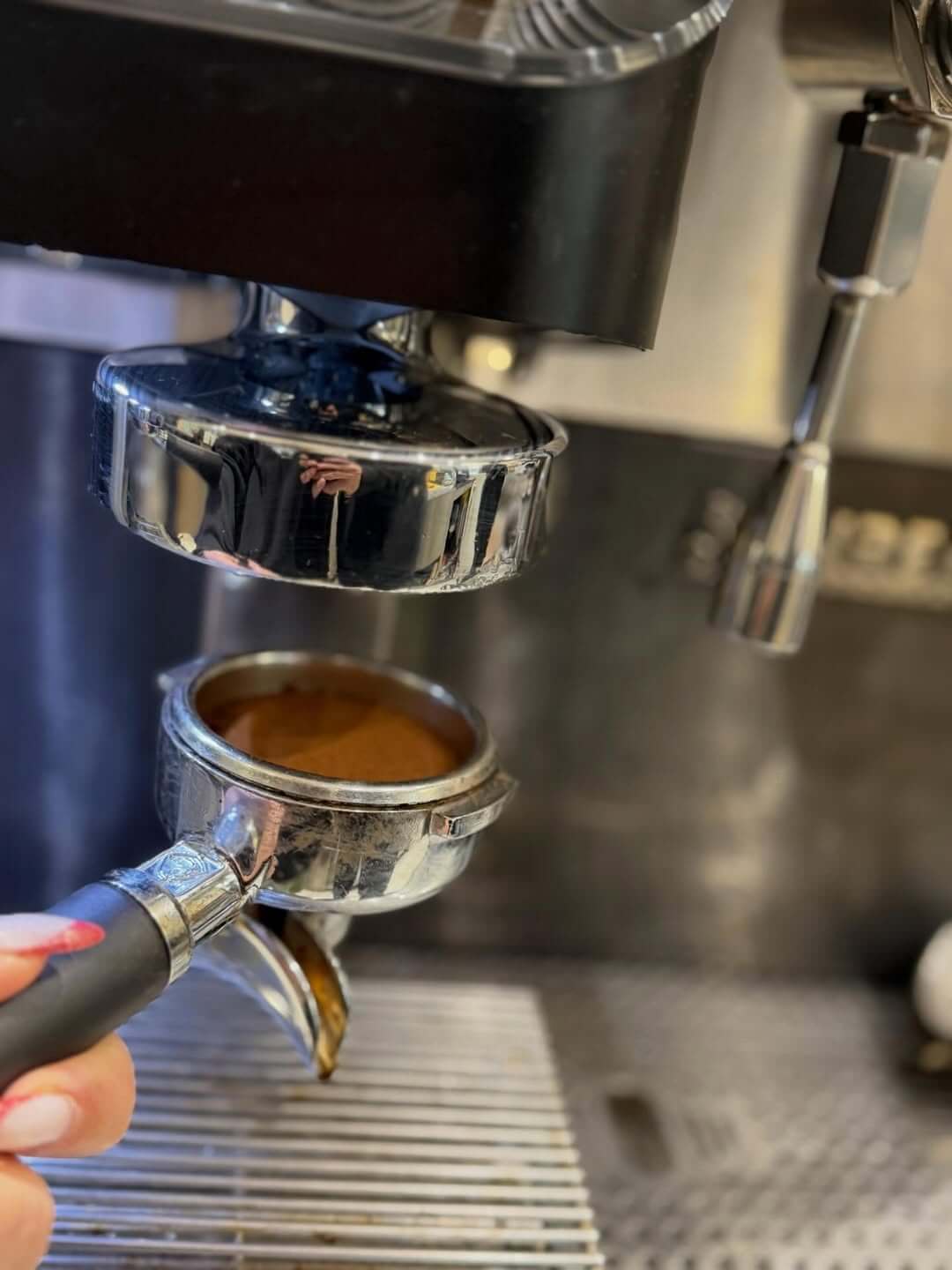 Barista preparing perfect espresso